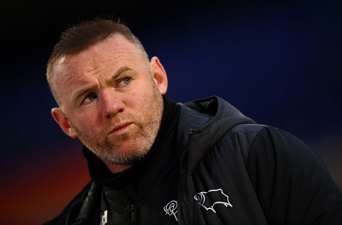 Wayne Rooney BIRMINGHAM, ENGLAND - MARCH 06: Wayne Rooney, manager of Derby County talks to the press after the Sky Bet Championship match between Coventry City and Derby County at St Andrew's Trillion Trophy Stadium on March 06, 2021 in Birmingham, England. Sporting stadiums around the UK remain under strict restrictions due to the Coronavirus Pandemic as Government social distancing laws prohibit fans inside venues resulting in games being played behind closed doors. (Photo by Clive Mason/Getty Images)