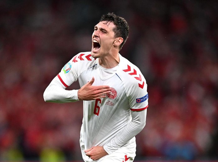 COPENHAGEN, DENMARK - JUNE 21: Andreas Christensen of Denmark of Denmark celebrates after scoring their side's third goal during the UEFA Euro 2020 Championship Group B match between Russia and Denmark at Parken Stadium on June 21, 2021 in Copenhagen, Denmark. (Photo by Stuart Franklin/Getty Images)