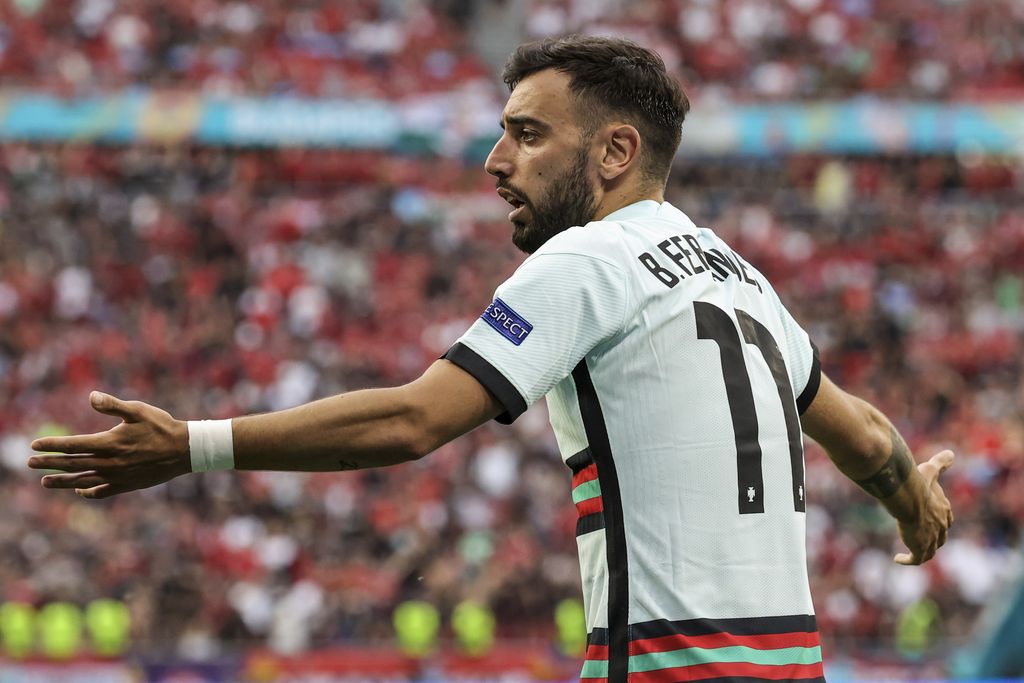 Portugal's Bruno Fernandes argues during the Euro 2020 soccer championship group F match between Hungary and Portugal at the Ferenc Puskas stadium in Budapest, Hungary, Tuesday, June 15, 2021. (Bernadett Szabo/Pool via AP)