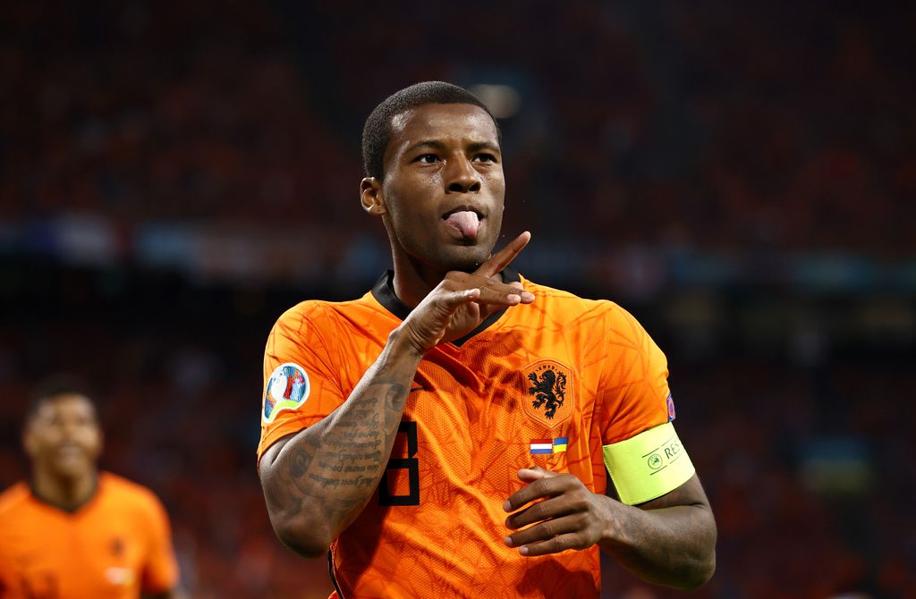 AMSTERDAM, NETHERLANDS - JUNE 13: Georginio Wijnaldum of Netherlands celebrates after scoring their side's first goal during the UEFA Euro 2020 Championship Group C match between Netherlands and Ukraine at the Johan Cruijff ArenA on June 13, 2021 in Amsterdam, Netherlands. (Photo by Koen van Weel - Pool/Getty Images)