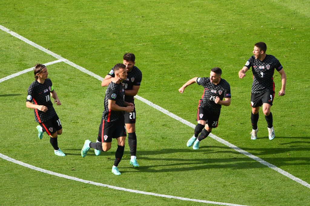 GLASGOW, SCOTLAND - JUNE 18: Ivan Perisic of Croatia celebrates with Bruno Petkovic and team mates after scoring their side's first goal during the UEFA Euro 2020 Championship Group D match between Croatia and Czech Republic at Hampden Park on June 18, 2021 in Glasgow, Scotland. (Photo by Andy Buchanan - Pool/Getty Images)
