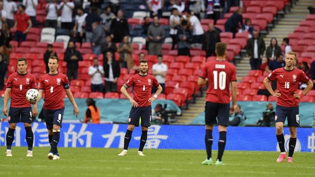 Czech Republic players react after England's Raheem Sterling scored the opening goal during the Euro 2020 soccer championship group D match between the Czech Republic and England at Wembley stadium in London, Tuesday, June 22, 2021. (Justin Tallis, Pool photo via AP)
