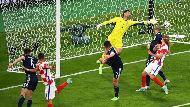 GLASGOW, SCOTLAND - JUNE 22: Ivan Perisic of Croatia scores their side's third goal past David Marshall of Scotland during the UEFA Euro 2020 Championship Group D match between Croatia and Scotland at Hampden Park on June 22, 2021 in Glasgow, Scotland. (Photo by Andy Buchanan - Pool/Getty Images)