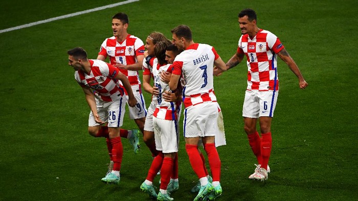 GLASGOW, SCOTLAND - JUNE 22: Ivan Perisic of Croatia celebrates with teammates after scoring their sides third goal during the UEFA Euro 2020 Championship Group D match between Croatia and Scotland at Hampden Park on June 22, 2021 in Glasgow, Scotland. (Photo by Andy Buchanan - Pool/Getty Images)