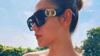 7 Momen Stylish BCL saat Isolasi Mandiri, Berjemur Pakai Sunnies LV