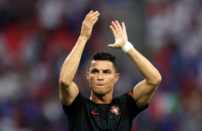BUDAPEST, HUNGARY - JUNE 23: Cristiano Ronaldo of Portugal applauds fans during the UEFA Euro 2020 Championship Group F match between Portugal and France at Puskas Arena on June 23, 2021 in Budapest, Hungary. (Photo by Alex Pantling/Getty Images)