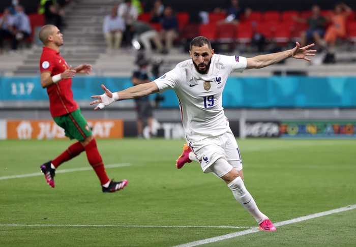 BUDAPEST, HUNGARY - JUNE 23: Karim Benzema of France celebrates after scoring their sides second goal during the UEFA Euro 2020 Championship Group F match between Portugal and France at Puskas Arena on June 23, 2021 in Budapest, Hungary. (Photo by Alex Pantling/Getty Images)