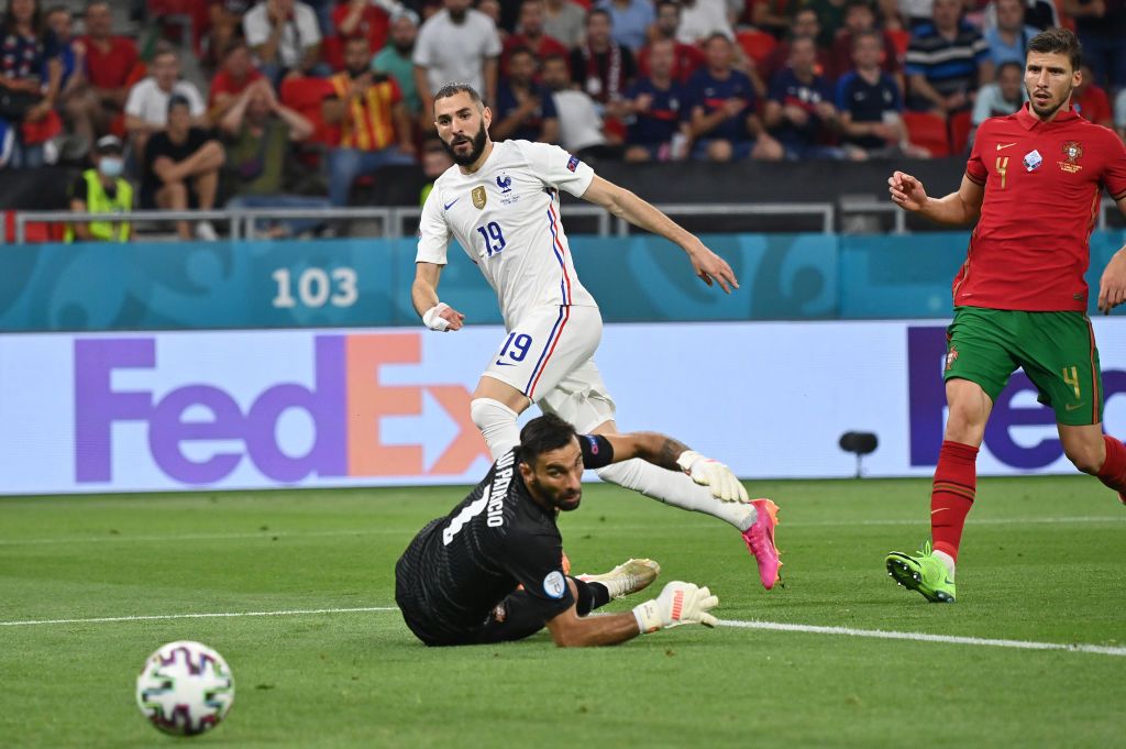 BUDAPEST, HUNGARY - JUNE 23: Karim Benzema of France celebrates after scoring their side's second goal during the UEFA Euro 2020 Championship Group F match between Portugal and France at Puskas Arena on June 23, 2021 in Budapest, Hungary. (Photo by Alex Pantling/Getty Images)