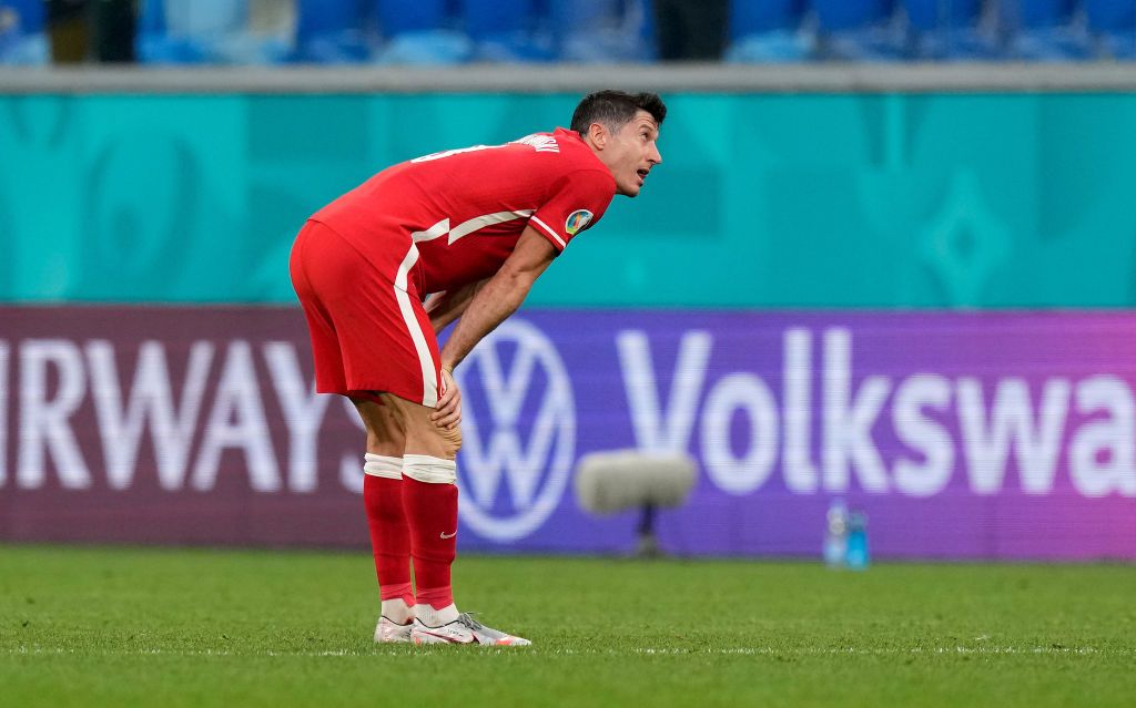 SAINT PETERSBURG, RUSSIA - JUNE 23: Robert Lewandowski of Poland acknowledges the Poland fans following their side's defeat in the UEFA Euro 2020 Championship Group E match between Sweden and Poland at Saint Petersburg Stadium on June 23, 2021 in Saint Petersburg, Russia. (Photo by Dmitry Lovetsky - Pool/Getty Images)