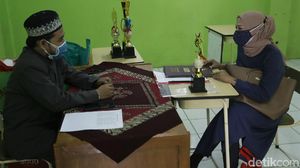 Terapkan Prokes Ketat, Sekolah di Bogor Bagi Rapor Tatap Muka