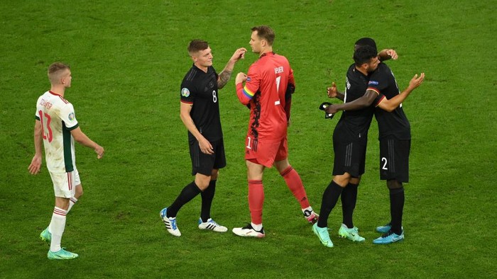 MUNICH, GERMANY - JUNE 23: Toni Kroos of Germany interacts with team mate Manuel Neuer after the UEFA Euro 2020 Championship Group F match between Germany and Hungary at Allianz Arena on June 23, 2021 in Munich, Germany. (Photo by Matthias Hangst/Getty Images)