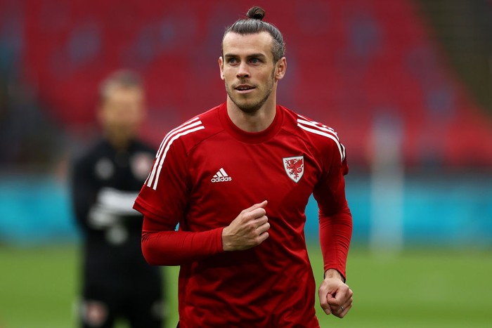 Gareth Bale AMSTERDAM, NETHERLANDS - JUNE 25: Gareth Bale of Wales looks on during the Wales Training Session ahead of the UEFA Euro 2020 Round of 16 match between Wales and Denmark at Johan Cruijff Arena on June 25, 2021 in Amsterdam, Netherlands. (Photo by Dean Mouhtaropoulos/Getty Images)