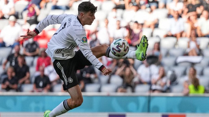 Germanys forward Kai Havertz leaps for the ball during the UEFA EURO 2020 Group F football match between Portugal and Germany at Allianz Arena in Munich on June 19, 2021. (Photo by Matthias Schrader / POOL / AFP)