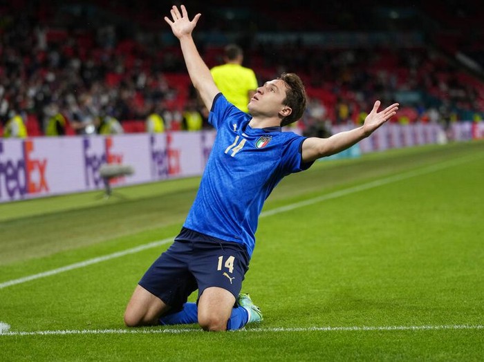 Italys Federico Chiesa celebrates after scoring his sides opening goal during the Euro 2020 soccer championship round of 16 match between Italy and Austria at Wembley stadium in London, Saturday, June 26, 2021. (AP Photo/Frank Augstein, Pool)