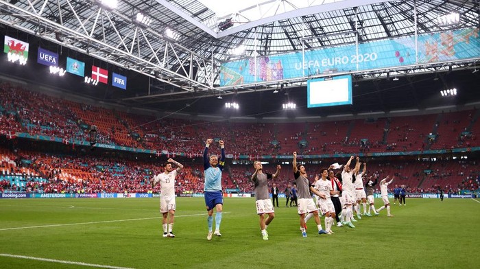 AMSTERDAM, NETHERLANDS - JUNE 26: A general view inside the stadium as players of Denmark celebrate their sides victory after the UEFA Euro 2020 Championship Round of 16 match between Wales and Denmark at Johan Cruijff Arena on June 26, 2021 in Amsterdam, Netherlands. (Photo by Dean Mouhtaropoulos/Getty Images)