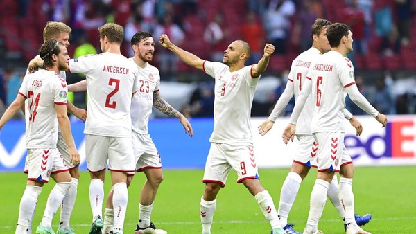Denmarks Martin Braithwaite, centre, celebrates after scoring his sides fourth goal during the Euro 2020 soccer championship round of 16 match between Wales and Denmark at Johan Cruyff ArenA in Amsterdam, Netherlands, Saturday, June 26, 2021. (Olaf Kraak/Pool via AP)