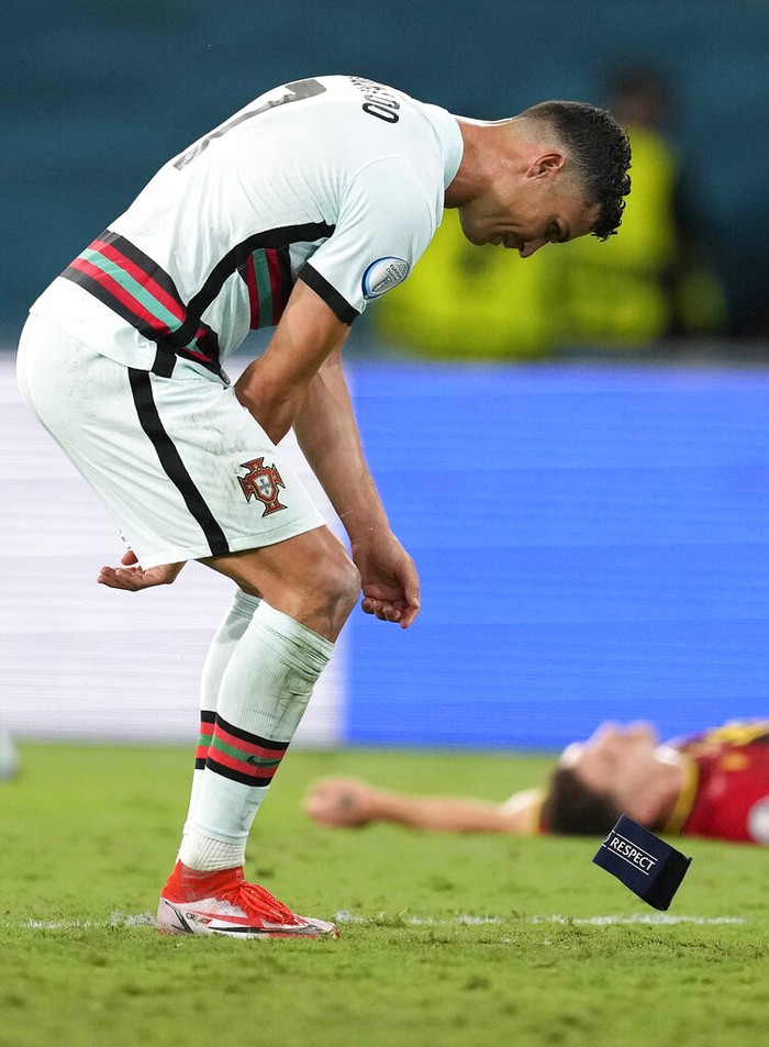 Cristiano Ronaldo Portugal's Cristiano Ronaldo reacts after his team lost the Euro 2020 soccer championship round of 16 match between Belgium and Portugal at the La Cartuja stadium in Seville, Spain,Sunday, June 27, 2021. (AP Photo/Thanassis Stavrakis, Pool)