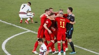 Kandas sudah harapan Ronaldo cs mempertahankan gelar juara Piala Eropa usai kandas di tangan Belgia. (Foto: AP/Jose Manuel Vidal)