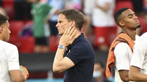 Netherlands coach Frank de Boer looks dejected after the Euro 2020 soccer championship round of 16 match between the Netherlands and Czech Republic at the Puskas Arena in Budapest, Hungary, Sunday, June 27, 2021. (Attila Kisbenedek/Pool via AP)