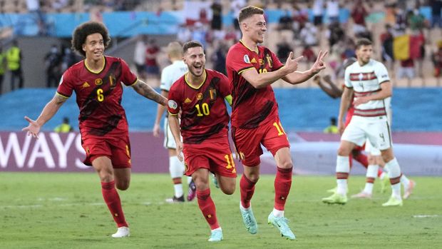 Soccer Football - Euro 2020 - Round of 16 - Belgium v Portugal - La Cartuja Stadium, Seville, Spain - June 27, 2021  Belgium's Thorgan Hazard celebrates scoring their first goal Pool via REUTERS/Thanassis Stavrakis