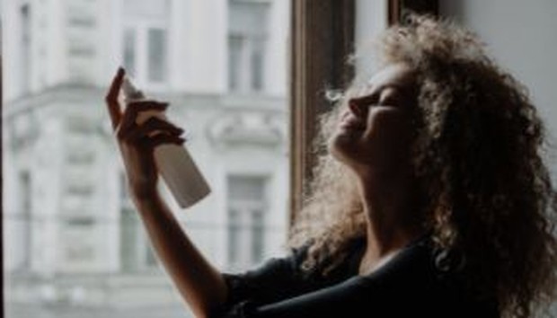 Spraying Face (pexels.com/cottonbro)