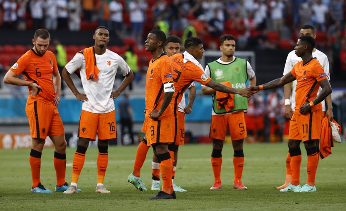 Players of Netherlands after the Euro 2020 soccer championship round of 16 match between Netherlands and Czech Republic at the Ferenc Puskas stadium in Budapest, Hungary, Sunday, June 27, 2021. (Bernadet Szabo/Pool via AP)