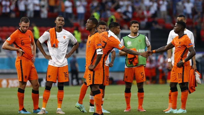 Players of Netherlands after the Euro 2020 soccer championship round of 16 match between Netherlands and Czech Republic at the Ferenc Puskas stadium in Budapest, Hungary, Sunday, June 27, 2021. (Bernadet Szabo/Pool via AP)