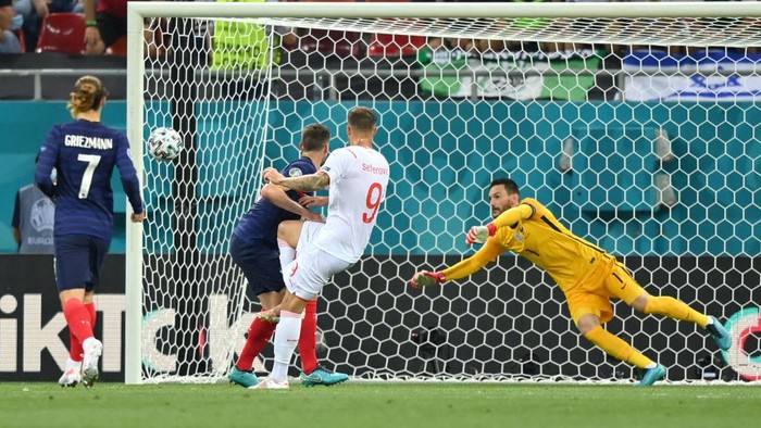 BUCHAREST, ROMANIA - JUNE 28: Haris Seferovic of Switzerland scores their sides first goal past Hugo Lloris of France during the UEFA Euro 2020 Championship Round of 16 match between France and Switzerland at National Arena on June 28, 2021 in Bucharest, Romania. (Photo by Justin Setterfield/Getty Images)