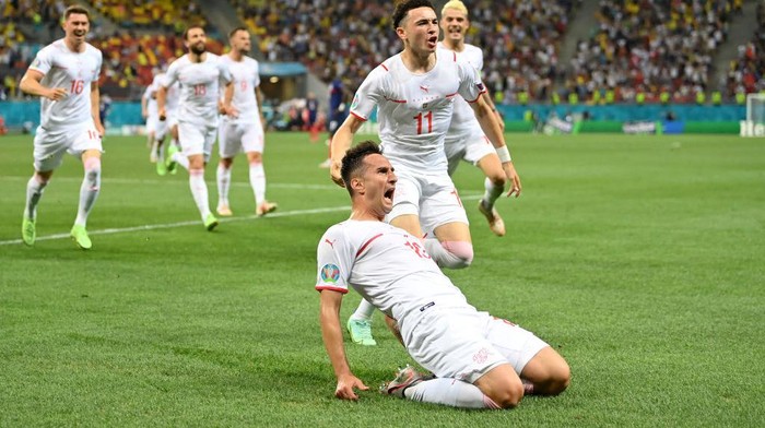 BUCHAREST, ROMANIA - JUNE 28: Mario Gavranovic of Switzerland celebrates after scoring their sides third goal during the UEFA Euro 2020 Championship Round of 16 match between France and Switzerland at National Arena on June 28, 2021 in Bucharest, Romania. (Photo by Justin Setterfield/Getty Images)
