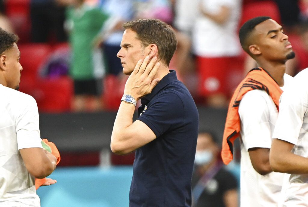 Netherlands coach Frank de Boer looks dejected after the Euro 2020 soccer championship round of 16 match between the Netherlands and Czech Republic at the Puskas Arena in Budapest, Hungary, Sunday, June 27, 2021. (Attila Kisbenedek/Pool via AP)