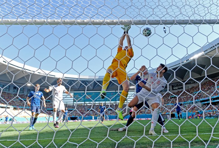 SEVILLE, SPAIN - JUNE 23: Martin Dubravka of Slovakia scores an own goal during the UEFA Euro 2020 Championship Group E match between Slovakia and Spain at Estadio La Cartuja on June 23, 2021 in Seville, Spain. (Photo by David Ramos/Getty Images)