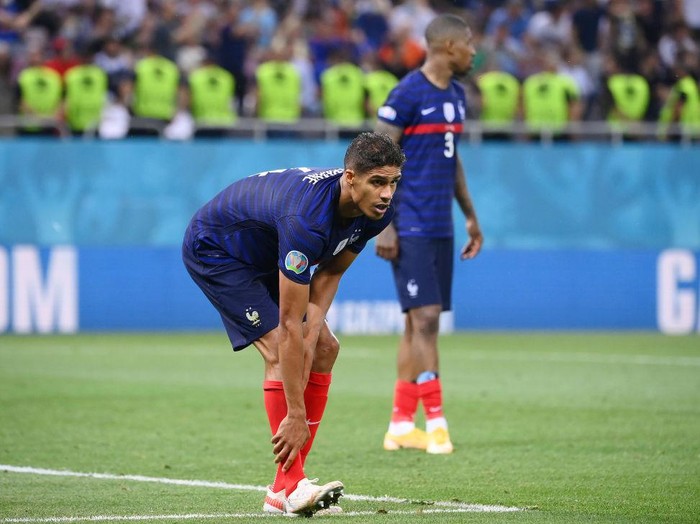 BUCHAREST, ROMANIA - JUNE 28: Raphael Varane of France reacts during the UEFA Euro 2020 Championship Round of 16 match between France and Switzerland at National Arena on June 28, 2021 in Bucharest, Romania. (Photo by Daniel Mihailescu - Pool/Getty Images)