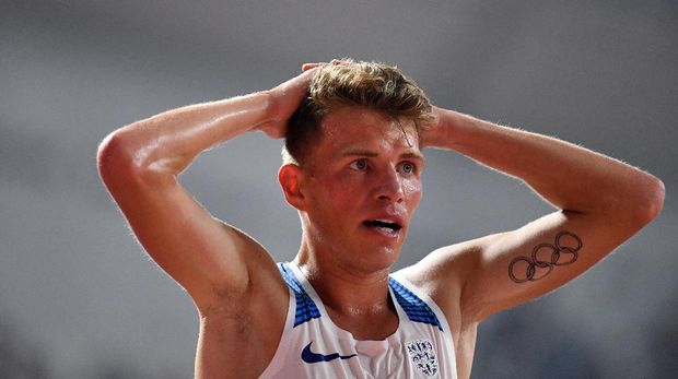 Britain's Andrew Butchart reacts after competing in the Men's 5000m heats at the 2019 IAAF World Athletics Championships at the Khalifa International stadium in Doha on September 27, 2019. (Photo by Jewel SAMAD / AFP)