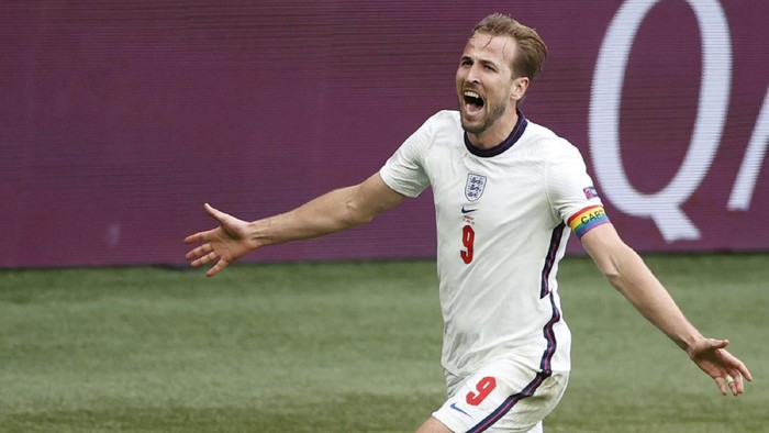 Englands Harry Kane celebrates after scoring his sides second goal during the Euro 2020 soccer match round of 16 between England and Germany at Wembley stadium in London, Tuesday, June 29, 2021. (John Sibley/Pool via AP)