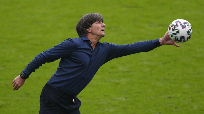 Joachim Loew Germany's manager Joachim Loew stops the ball during the Euro 2020 soccer championship round of 16 match between England and Germany, at Wembley stadium, in London, Tuesday, June 29, 2021. (Matthew Childs/Pool via AP)