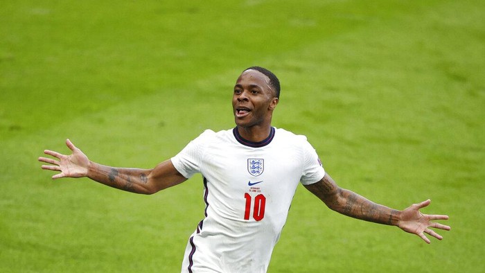 Englands Raheem Sterling celebrates after scoring his sides opening goal during the Euro 2020 soccer match round of 16 between England and Germany at Wembley stadium in London, Tuesday, June 29, 2021. (John Sibley/Pool via AP)