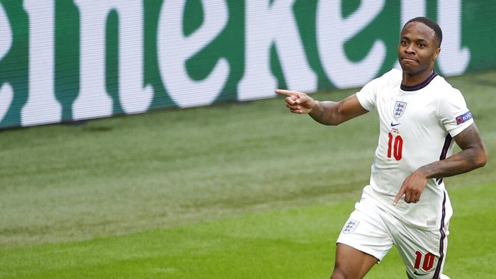 Englands Raheem Sterling celebrates after scoring his sides opening goal during the Euro 2020 soccer match round of 16 between England and Germany at Wembley stadium in London, Tuesday, June 29, 2021. (John Sibley/Pool via AP)