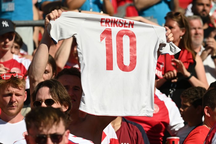 COPENHAGEN, DENMARK - JUNE 17: A Denmark shirt with Christian Eriksen, Number Ten is raised in the crowd prior to the UEFA Euro 2020 Championship Group B match between Denmark and Belgium at Parken Stadium on June 17, 2021 in Copenhagen, Denmark. (Photo by Jonathan Nackstrand - Pool/Getty Images)