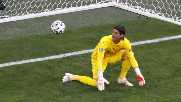 Switzerland's goalkeeper Yann Sommer watches the ball go into the net after a shot by Spain's Jordi Alba during the Euro 2020 soccer championship quarterfinal match between Switzerland and Spain at Saint Petersburg Stadium in St. Petersburg, Russia, Friday, July 2, 2021. (Anton Vaganov/Pool via AP)