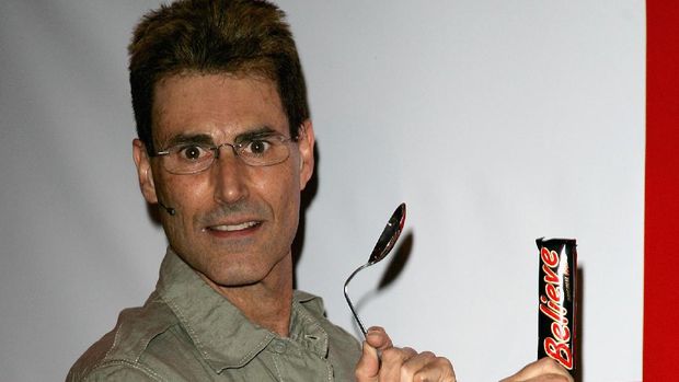 LONDON - JUNE 07:  Uri Geller poses at 'Believe-athon' on June 07, 2006 in London, England. Uri Geller was commissioned by Mars, re-named MARS Believe for the duration of the world cup. He held the Believe-athon to inspire positive thinking for England fans and to help the England team win the world cup.  (Photo by Gareth Cattermole/Getty Images)