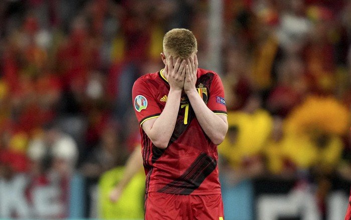 Belgiums Kevin De Bruyne reacts during the Euro 2020 soccer championship quarterfinal match between Belgium and Italy at the Allianz Arena stadium in Munich, Germany, Friday, July 2, 2021. (AP Photo/Matthias Schrader, Pool)