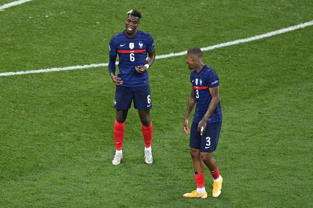BUCHAREST, ROMANIA - JUNE 28: Paul Pogba of France celebrates with Presnel Kimpembe after scoring their side's third goal during the UEFA Euro 2020 Championship Round of 16 match between France and Switzerland at National Arena on June 28, 2021 in Bucharest, Romania. (Photo by Mihai Barbu - Pool/Getty Images)