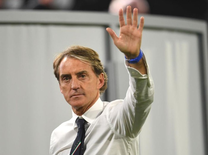 MUNICH, GERMANY - JULY 02: Roberto Mancini, Head Coach of Italy reacts following victory in the UEFA Euro 2020 Championship Quarter-final match between Belgium and Italy at Football Arena Munich on July 02, 2021 in Munich, Germany. (Photo by Andreas Geber - Pool/Getty Images)