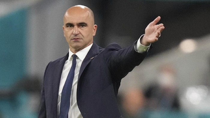 Belgiums manager Roberto Martinez gestures during the Euro 2020 soccer championship quarterfinal match between Belgium and Italy at the Allianz Arena stadium in Munich, Germany, Friday, July 2, 2021. (AP Photo/Matthias Schrader, Pool)