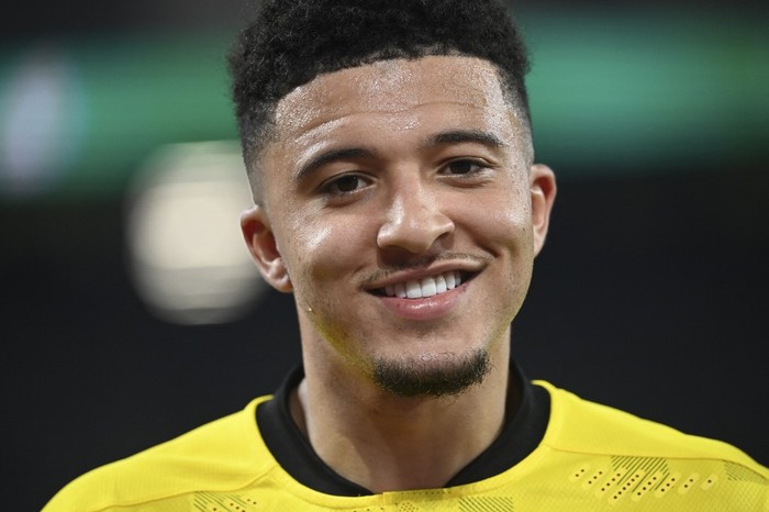 (FILES) In this file photo taken on May 1, 2021 Dortmunds English midfielder Jadon Sancho reacts during the German Cup (DFB Pokal) semi-final football match BVB Borussia Dortmund v Holstein Kiel in Dortmund, western Germany. - Jadon Sancho set to join Manchester United according to media reports on June 30, 2021. (Photo by Ina Fassbender / POOL / AFP)