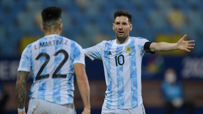 GOIANIA, BRAZIL - JULY 03: Lautaro Martinez of Argentina celebrates with teammate Lionel Messi after scoring the second goal of his team during a quarter-final match of Copa America Brazil 2021 between Argentina and Ecuador at Estadio Olimpico on July 03, 2021 in Goiania, Brazil. (Photo by Pedro Vilela/Getty Images)