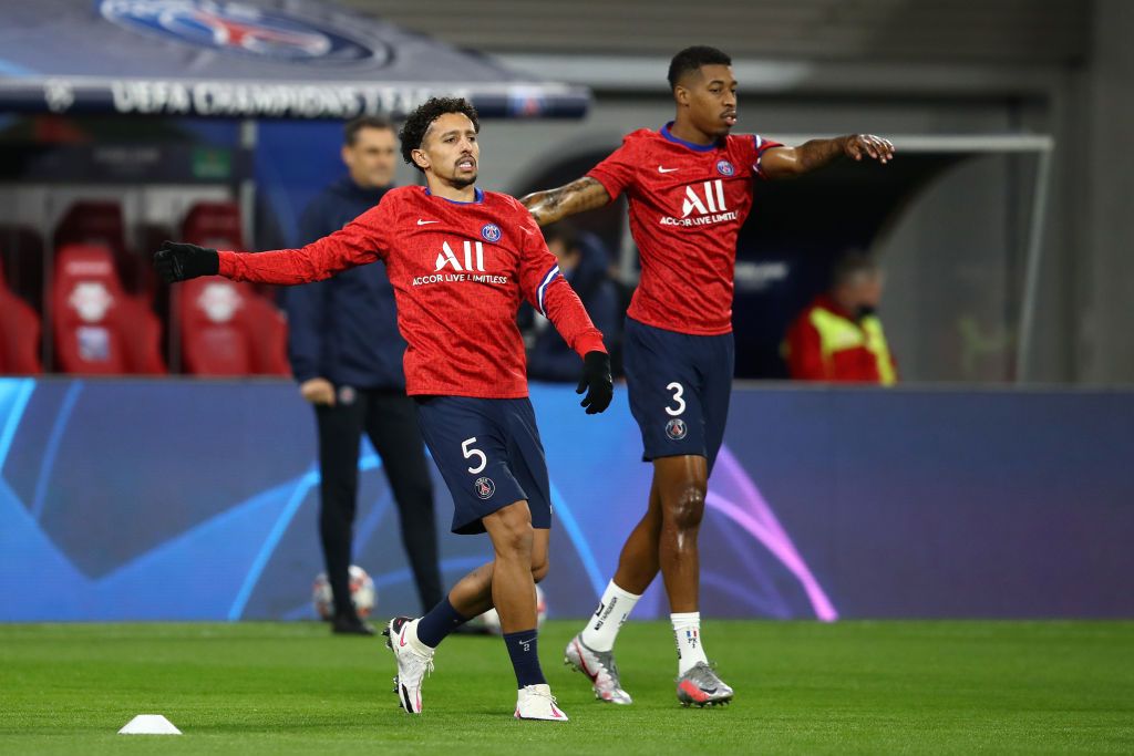LEIPZIG, GERMANY - NOVEMBER 04: Marquinhos and Presnel Kimpembe of Paris Saint-Germain warms up ahead of the UEFA Champions League Group H stage match between RB Leipzig and Paris Saint-Germain at Red Bull Arena on November 04, 2020 in Leipzig, Germany. Sporting stadiums around Germany remain under strict restrictions due to the Coronavirus Pandemic as Government social distancing laws prohibit fans inside venues resulting in games being played behind closed doors. (Photo by Maja Hitij/Getty Images)