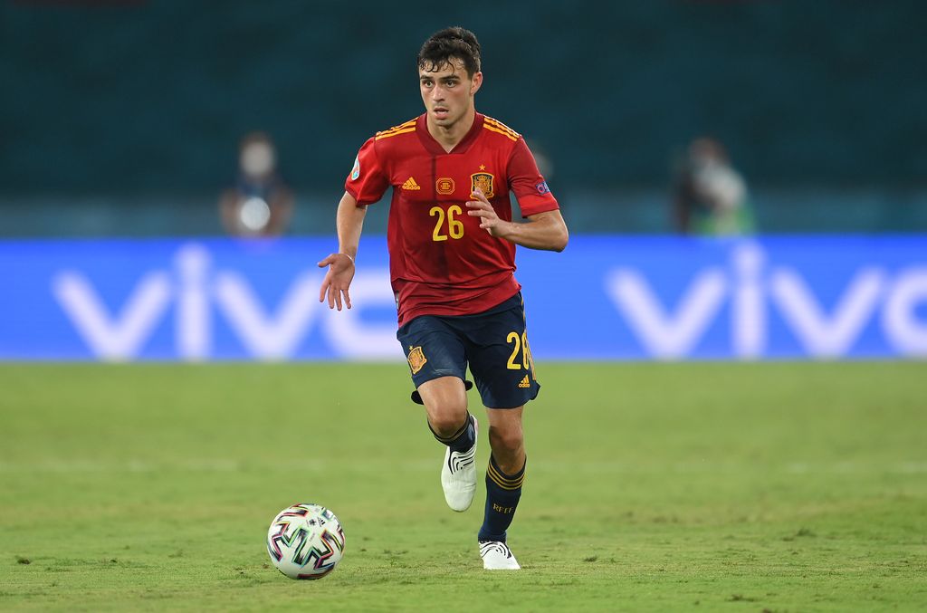 SEVILLE, SPAIN - JUNE 14: Pedri of Spain runs with the ball during the UEFA Euro 2020 Championship Group E match between Spain and Sweden at the La Cartuja Stadium on June 14, 2021 in Seville, Spain. (Photo by David Ramos/Getty Images)