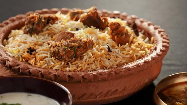 ilustrasi nasi mandhi biryani Mutton Gosht Biryani - Lamb, hogget, and mutton are the meat of domestic sheep or Goat. Biryani, biriani, or beriani is a set of primarily South Asian rice-based foods made with spices,rice (usually basmati) and meat/vegetables. Mutton gosht biryani contains Mutton as a major ingredient.