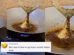 Kocak! Wanita Ini Goreng Ikan dengan Posisi Duyung dalam Kuali